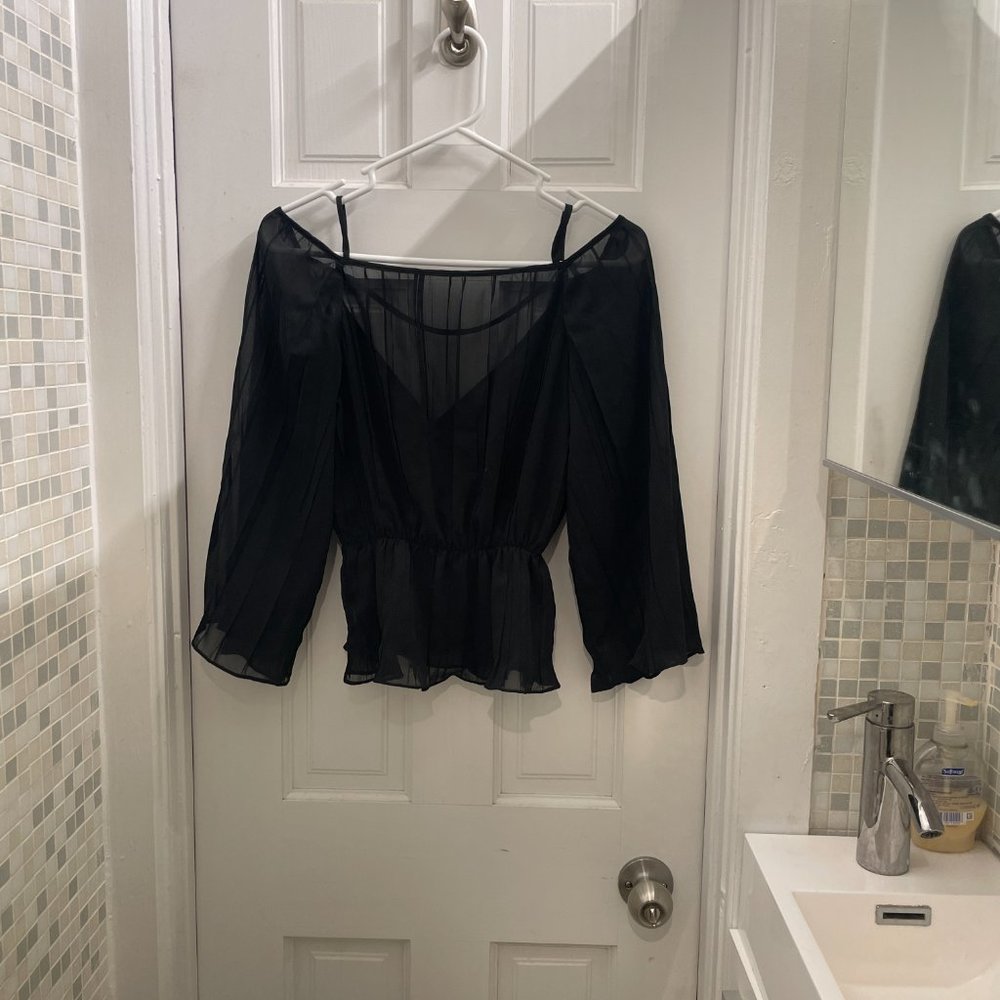 Sheer black top with cut-out sholders